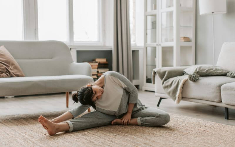 peaceful woman waking up in morning practicing gratitude self care routine
