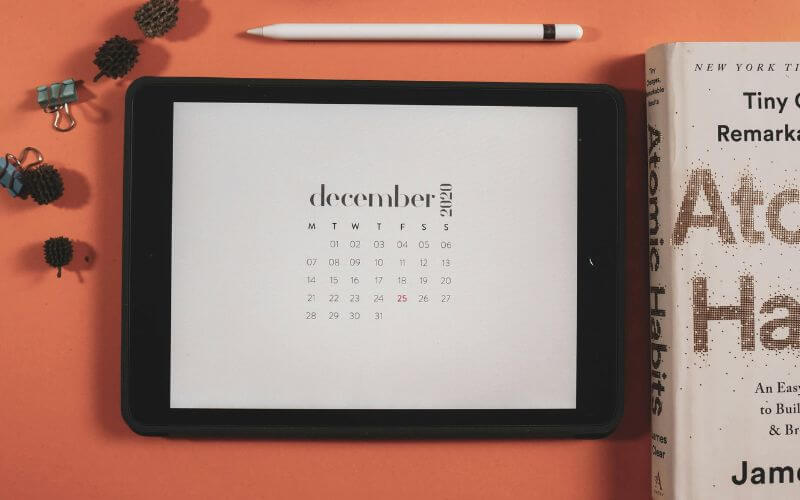 why daily habits fail - person overwhelmed with too many tasks