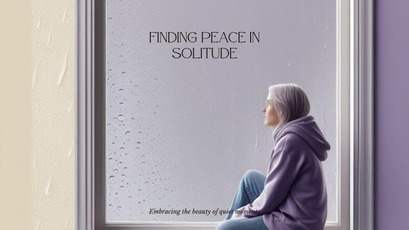 person sitting by window reflecting to accept yourself and move forward